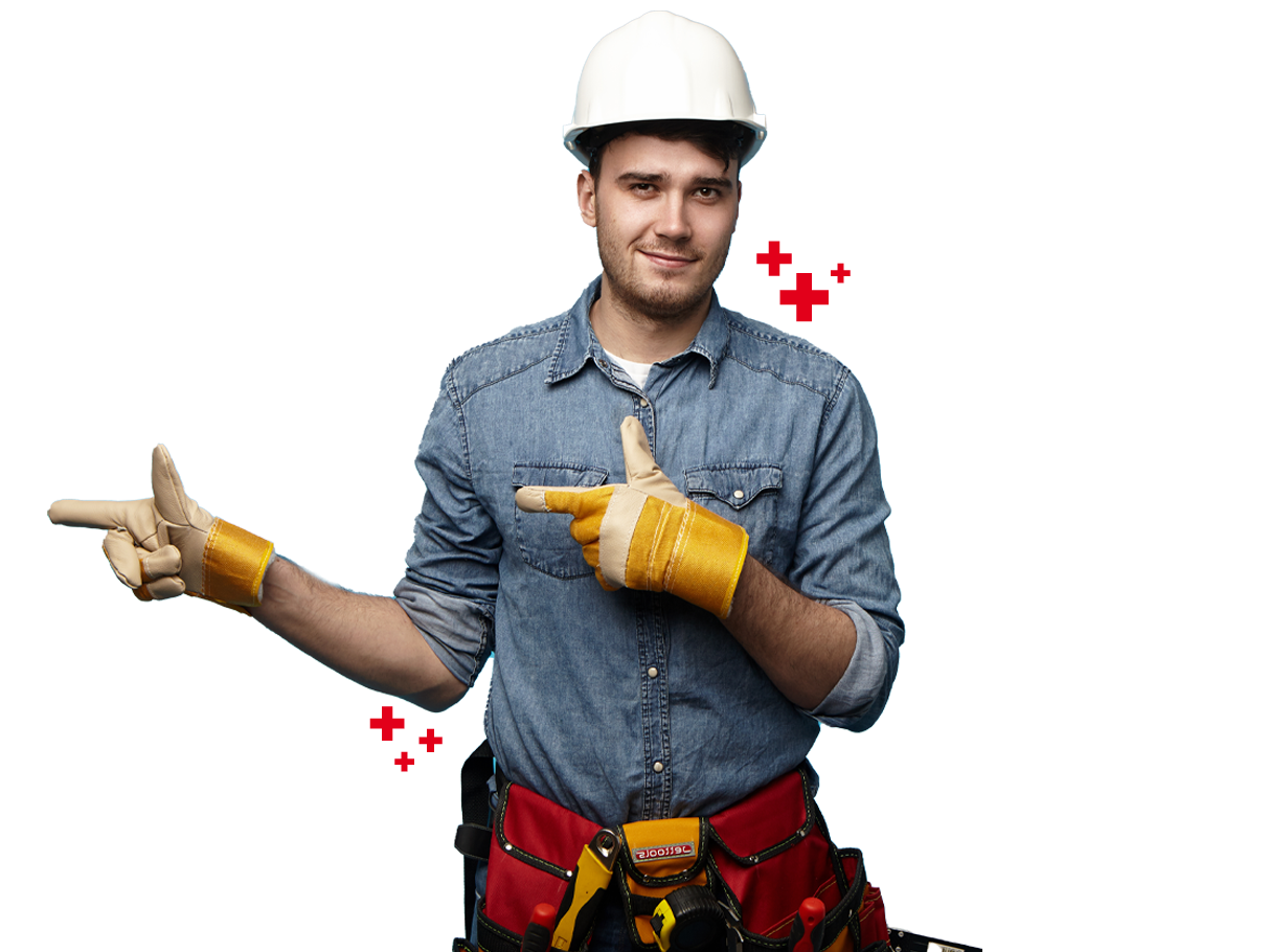 Trabajador de la construcción con casco y guantes señalando con ambas manos.